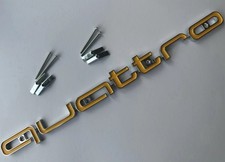 Gelb und Chrom Quattro Emblem